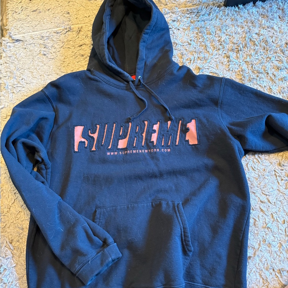 Supreme Dark Blue Hoodie with Pink Accents